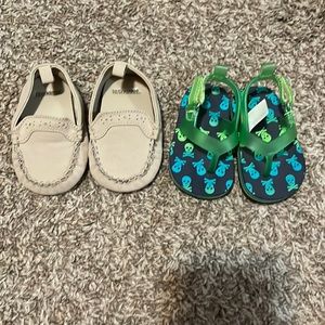 Two pairs of baby shoes.